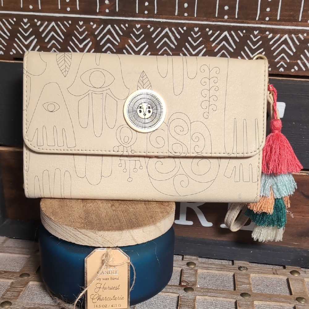 Hamsa Hand Artistic Beige Clutch with Tassels By Jungalow